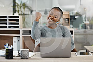 Black woman, laptop and celebration with fist for winning, success or promotion bonus at office. Happy business woman
