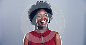 Black woman, laughing and happy with comedy, funny and joke for comic, meme and on studio background. Humour, face and