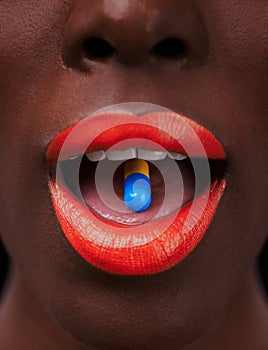 Black woman, lipstick and pill in mouth for health, beauty supplement and bright makeup color on dark background