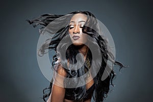 Black woman with long luxurious shiny hair