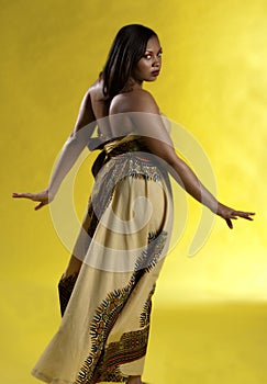 Black woman model with long black flowing hair, smooth skin, elegant eye shadow.
