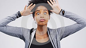 Black woman, omg face and shocked on studio background for wow with crazy, wtf and emoji reaction. African female person
