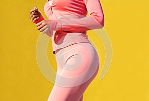 Black woman with pink sportswear