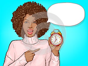 Black woman pointing by finger to alarm clock