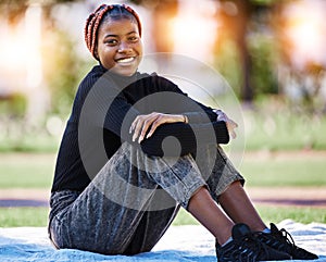 Black woman, portrait or relax on campus park, nature garden or environment field in college, university or school study