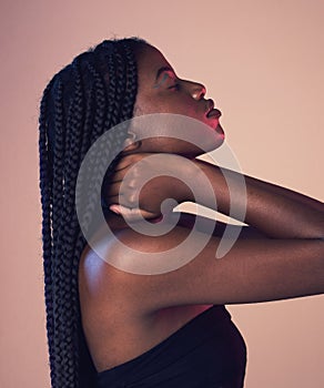 Black woman profile, face and braids with eyes closed, makeup and beauty isolated on studio background. Natural