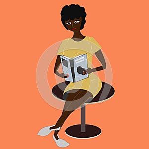 Black woman reads a book. Girl with curly dark hair holds paper book