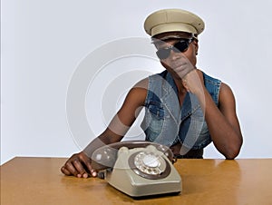 Black woman with retro phone