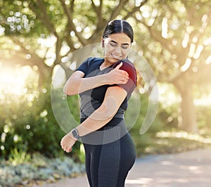 Black woman, runner and muscle pain in arm while outdoor for fitness, workout or exercise in park. Woman, running and