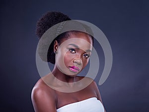 Black woman, serious or portrait for beauty, skincare, natural cosmetics and healthy shine isolated in studio. Face