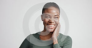 Black woman with a short haircut in studio shoot