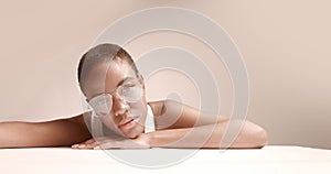 Black woman with a short haircut in studio shoot