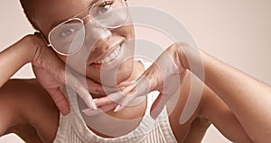 Black woman with a short haircut in studio shoot