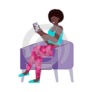 Black woman sitting on chair using phone app with chat messenger.