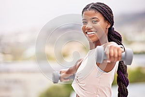 Black woman, smile and dumbbell workout outdoor for fitness training, sports exercise and healthy body lifestyle