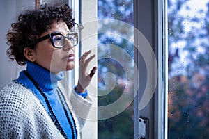 Black woman suffering bad weather and rainy day