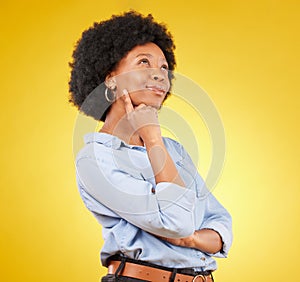 Black woman, thinking face and smile in studio with idea or memory on yellow background. African female think of space