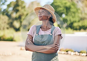 Black woman, thinking and farmer with arms crossed in nature for sustainability outdoor. Idea, agriculture and confident