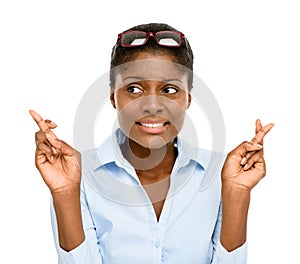 Black woman, thinking and fingers crossed for luck or hope isolated on a transparent PNG background. Face of African