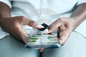 Black Woman Using Mobile Phone For Text Messaging