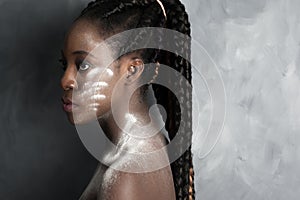 Black woman with wite powder