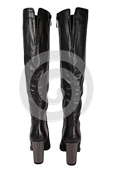 Black women& x27;s leather boots on a white background. Women& x27;s classic fashion spring and autumn high heel shoes