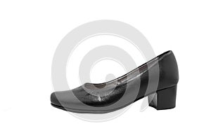 Black women`s low-heeled shoes on a white background