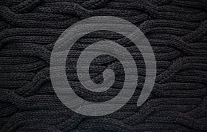 Black woolen cable knit pattern