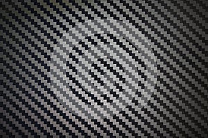 Black woven carbon fibre texture pattern background
