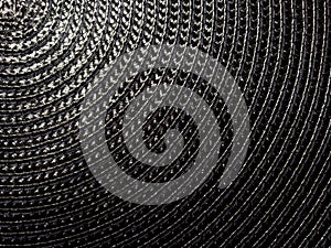 Black woven textile mat background