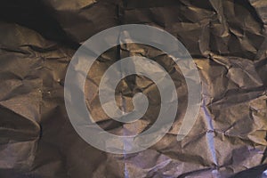 Black wrinkled paper texture