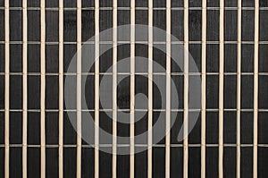 Black and yellow bamboo mat background 3:2 ratio