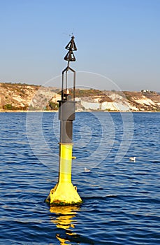 Black and yellow channel marker