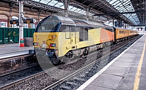 Black yellow and orange diesel locomotive