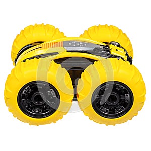 Black and yellow plastic radio controlled car isolated on the white