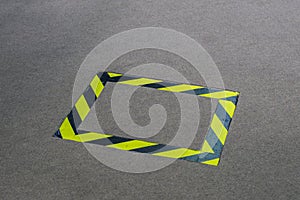 Black and yellow tape placed on the carpet for avoiding any accident