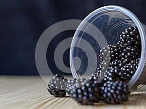 Blackberries in a plastic cup