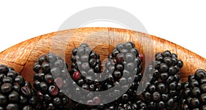 Blackberries in wooden dish