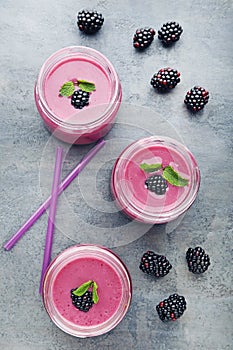 Blackberries yogurt in bottles