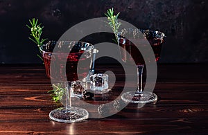 Blackberry Bramble with fresh muddled blackberries, gin, lemon juice, and soda water