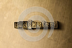 BLACKBERRY - close-up of grungy vintage typeset word on metal backdrop