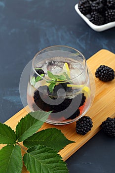 Blackberry detox water and ice in glass photo
