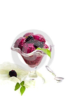 Blackberry fruit ice cream in a cup isolated