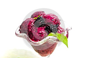Blackberry fruit ice cream in a cup isolated