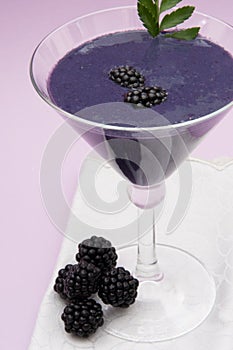 Blackberry shake in a cocktail glass
