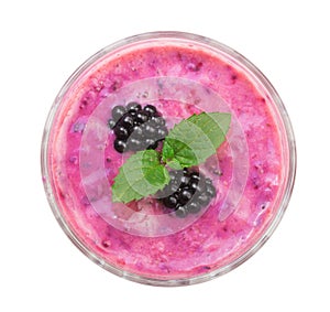 Blackberry yogurt or smoothie with mint leaves isolated on white background. Top view. Healthy Eating