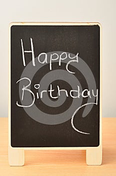 Blackboard with a happy birthday message