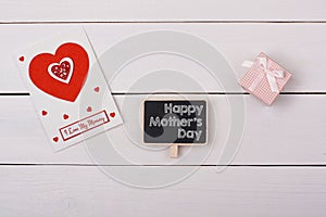 Blackboard with happy mathers day tag, a gift