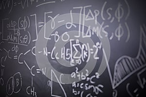 Blackboard inscribed with mathematical formulas photo