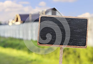 Blackboard label and a single family house